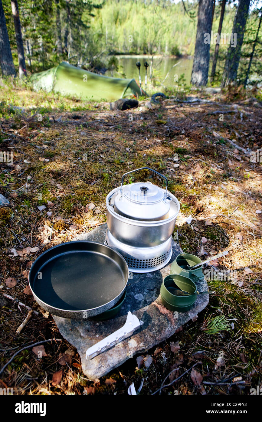 A camp stove set up in nature, ready for a meal Stock Photo Alamy