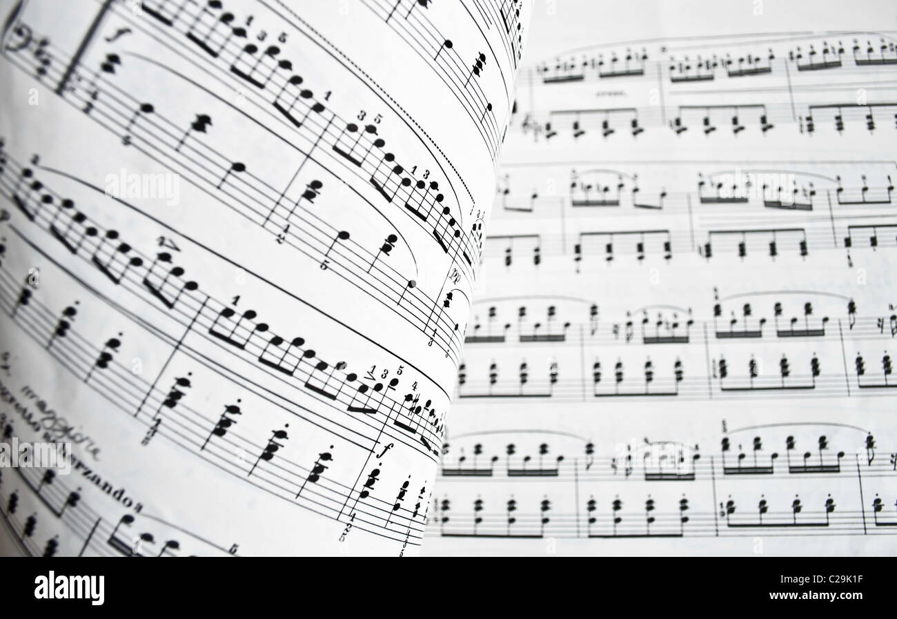Page of a musical score with notes anc octaves Stock Photo
