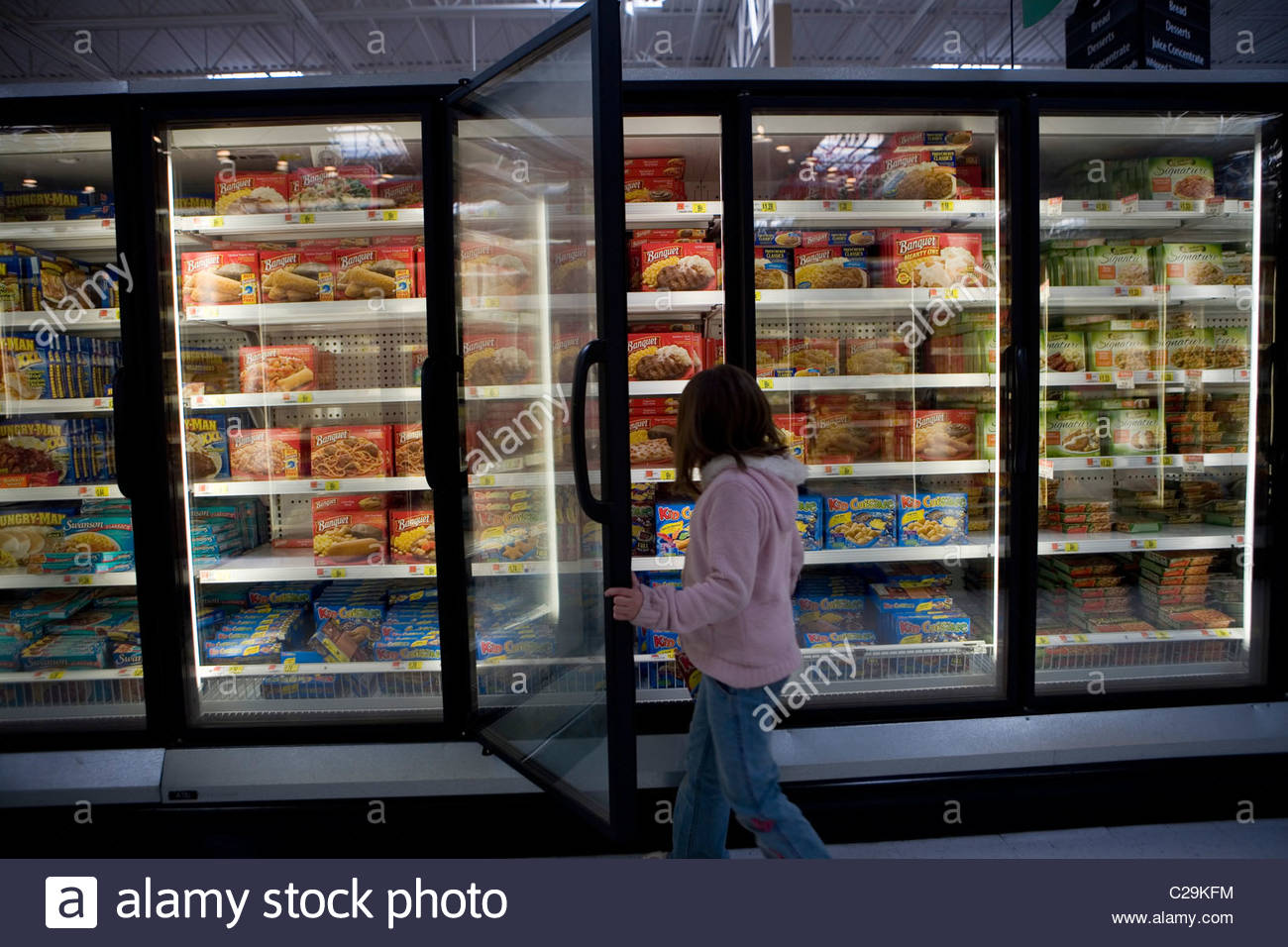 The energy efficient refrigerated freezer section of a Walmart Stock