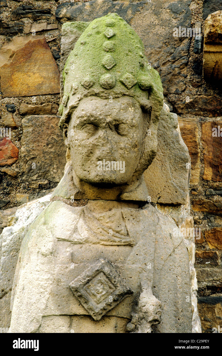 Elgin Cathedral, medieval carved stone figure figures Scottish 13th century gothic cathedrals UK detail of Bishop Innes Stock Photo