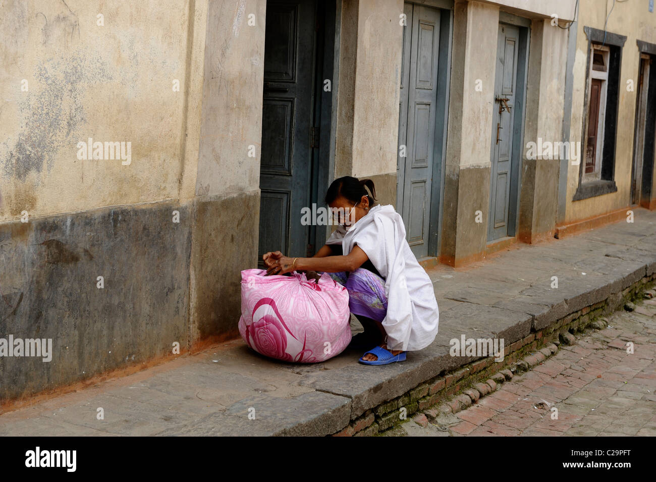 nepalese lady preparing her laundry, peoples lives ( the nepalis