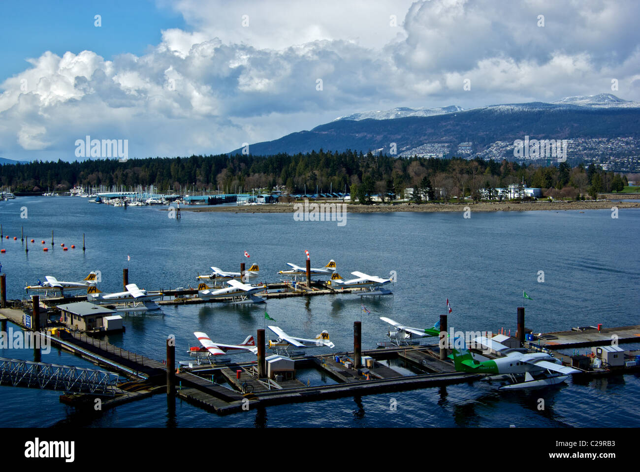 Harbour Westcoast Air float plane base Vancouver harbour snow capped North Shore mountains Stock Photo