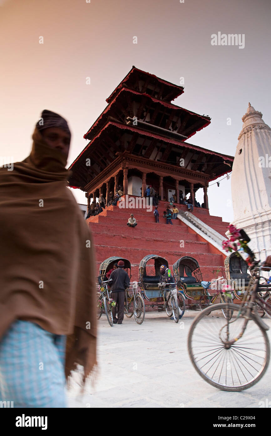 Man in traditional nepali clothing walking in Durbar Square. Kathmandu, Nepal Stock Photo Alamy