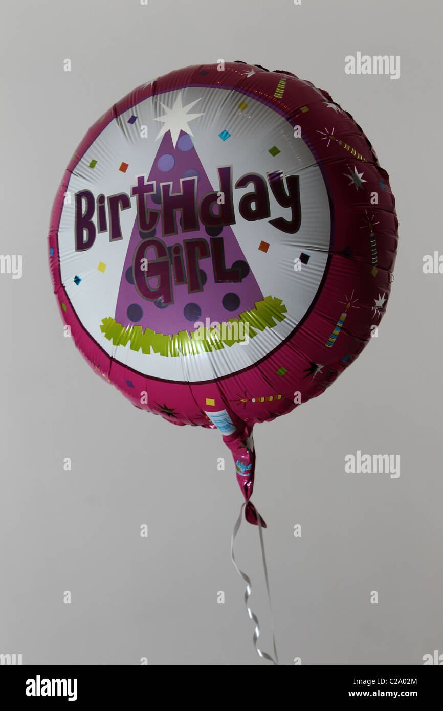 A Birthday Girl balloon pictured in a flat in Hove, East Sussex, UK. Stock Photo