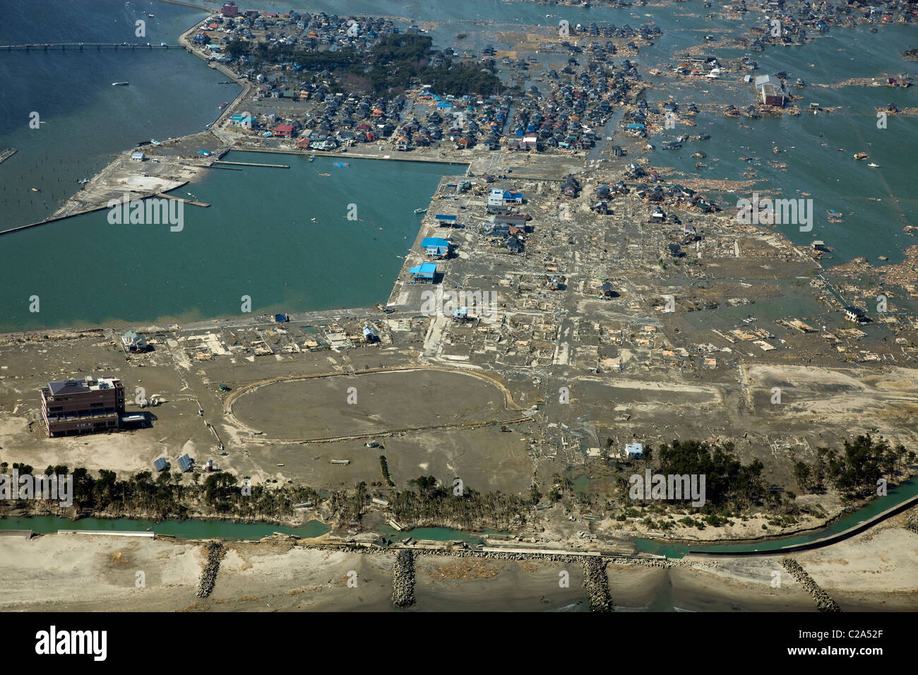 Aerial view of damage to Watari District, Miyagi Prefecture, Japan after a 9. 0 magnitude earthquake and subsequent tsunami Stock Photo