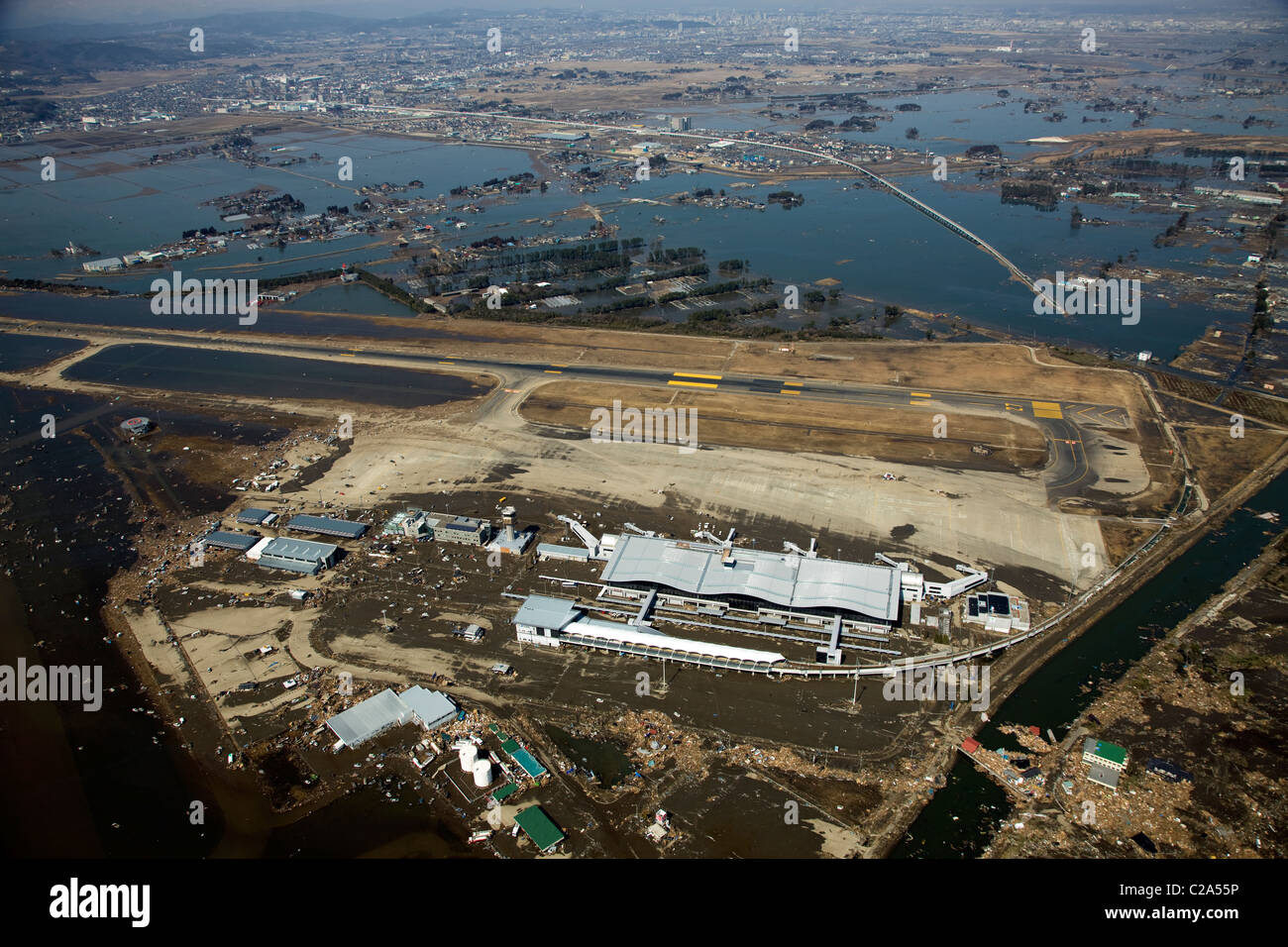 Aerial view of damage to Sendai Airport, Iwanuma, Miyagi Prefecture after a 9. 0 magnitude earthquake and subsequent tsunami Stock Photo