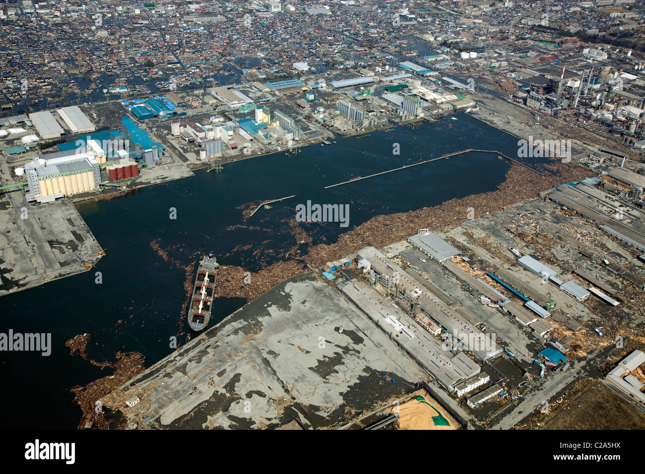 Aerial view of shipa washed away and damage to Ishinomaki Port in Ishinomaki, Miyagi Prefecture after a 9. 0 magnitude Stock Photo