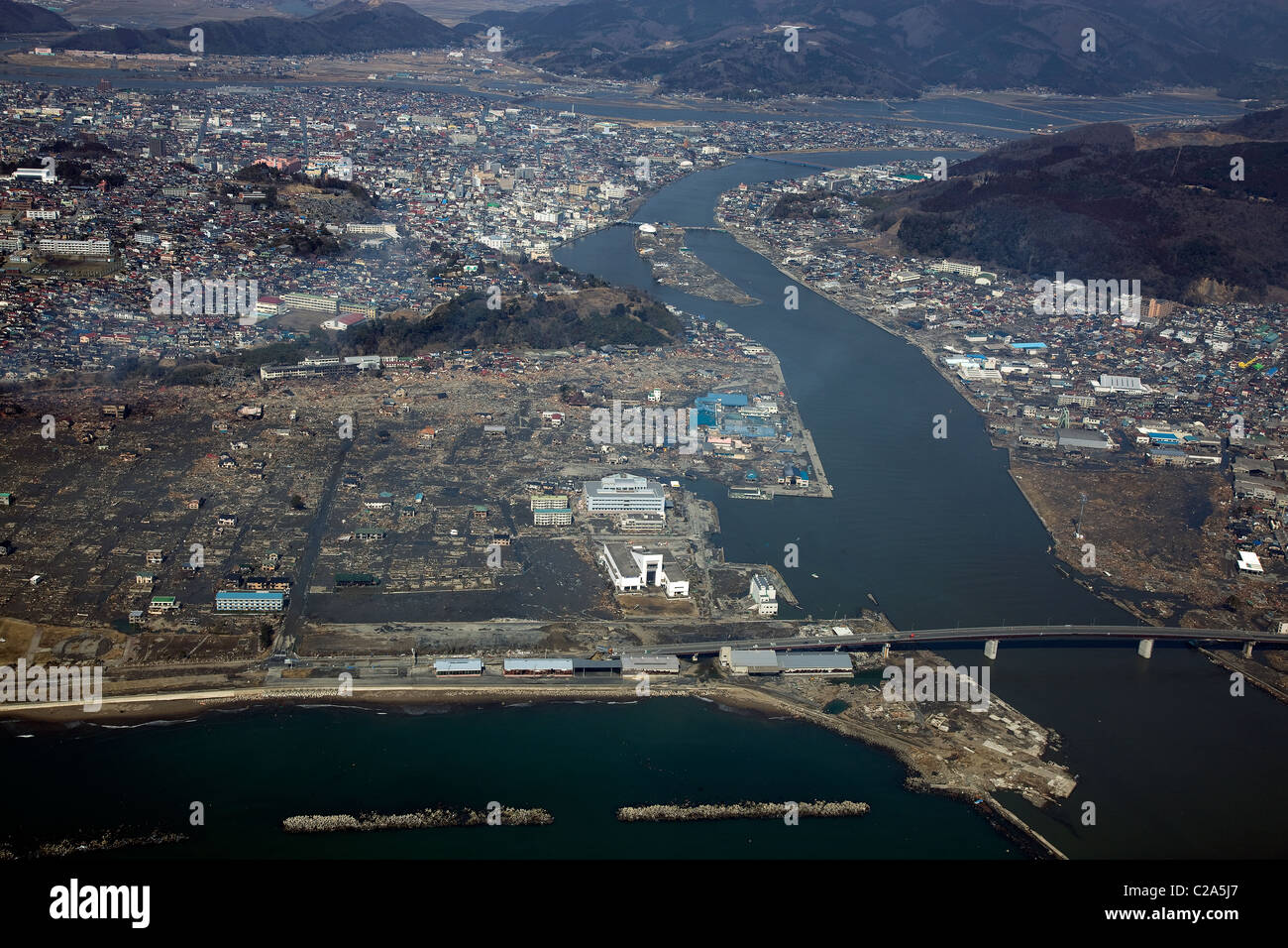 Aerial view of damage to Ishinomaki, Miyagi Prefecture after a 9. 0 magnitude earthquake and subsequent tsunami devastated the Stock Photo