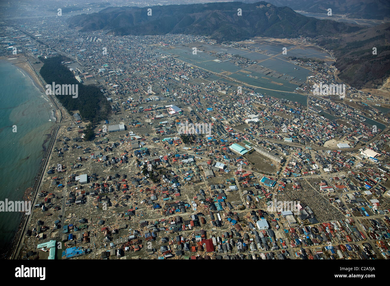 Aerial view of damage to Ishinomaki, Miyagi Prefecture after a 9. 0 magnitude earthquake and subsequent tsunami devastated the Stock Photo