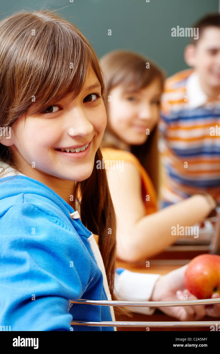 Confident student looking at camera during lesson Stock Photo - Alamy