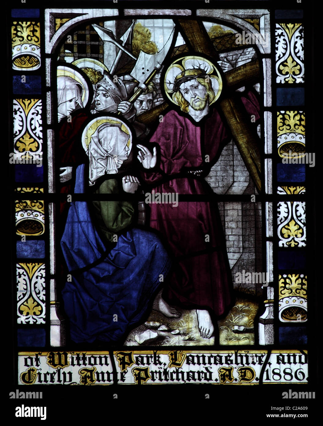 A stained glass window by Burlison and Grylls depicting the Passion of Christ; All Saints Church, Watermillock, Cumbria Stock Photo