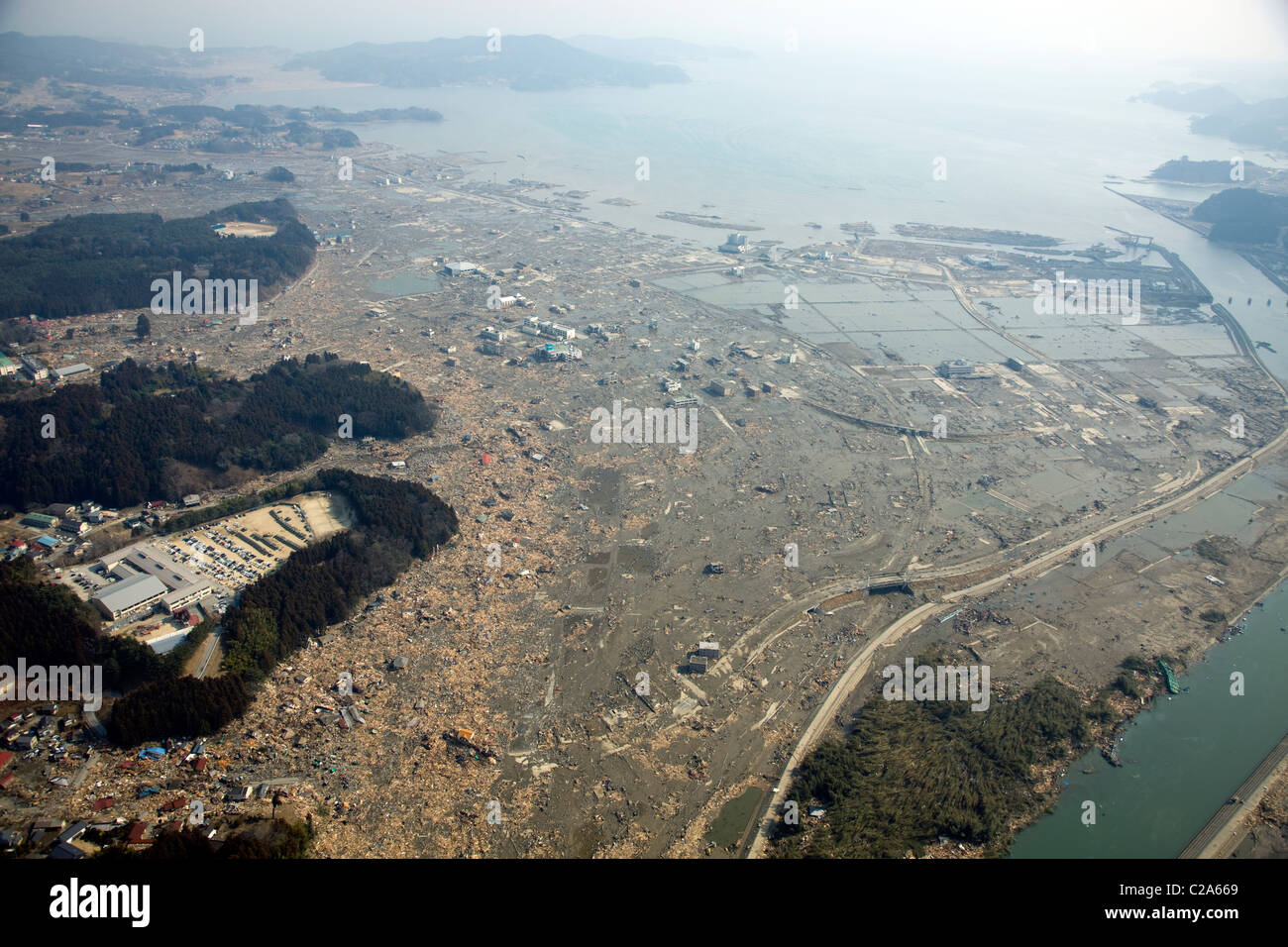 Aerial view of damage to Rikuzentakata, Iwate Prefecture after a 9. 0 magnitude earthquake and subsequent tsunami devastated Stock Photo