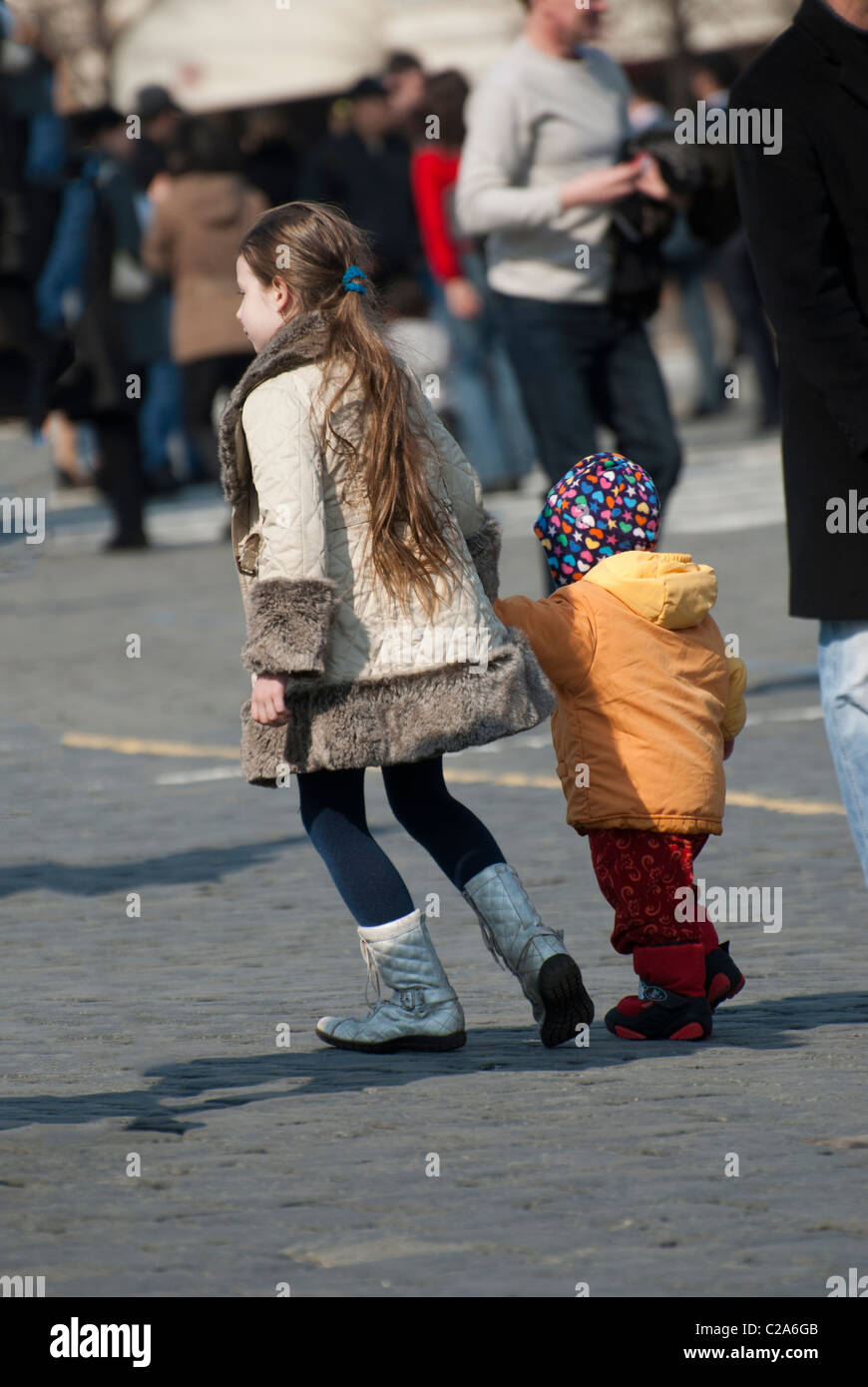 A little girl with her little brother Stock Photo - Alamy