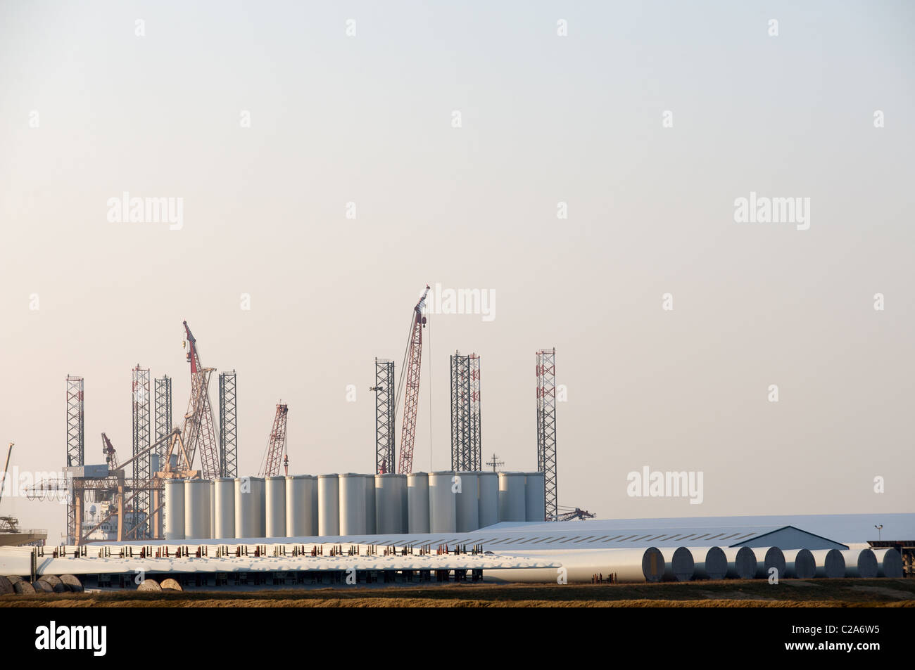 Wind turbines for London Array wind farm being stored at Harwich International port, Essex, UK. Stock Photo