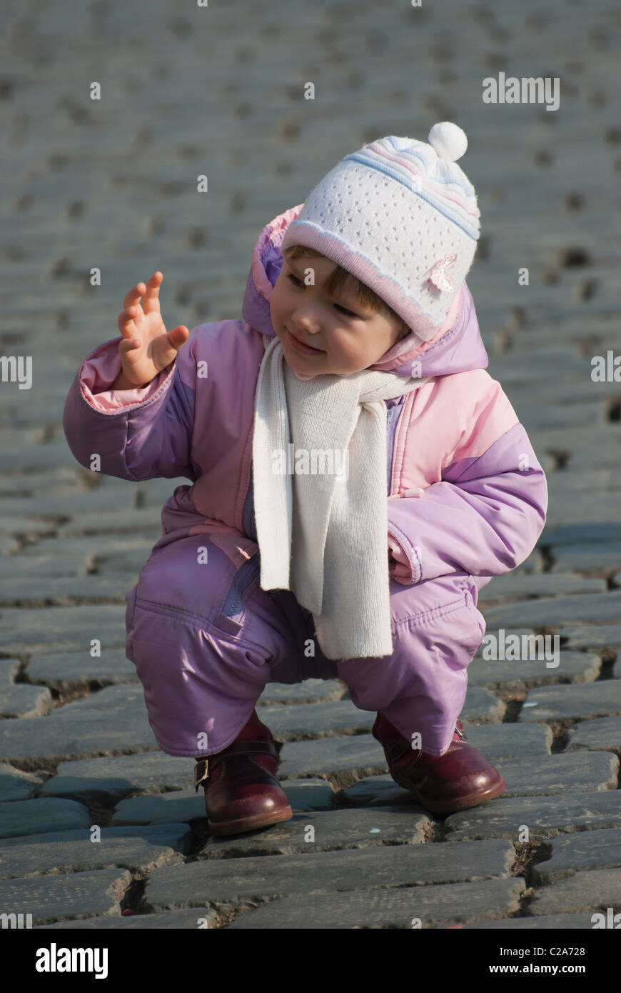 Little girl in pink jumpers Stock Photo Alamy