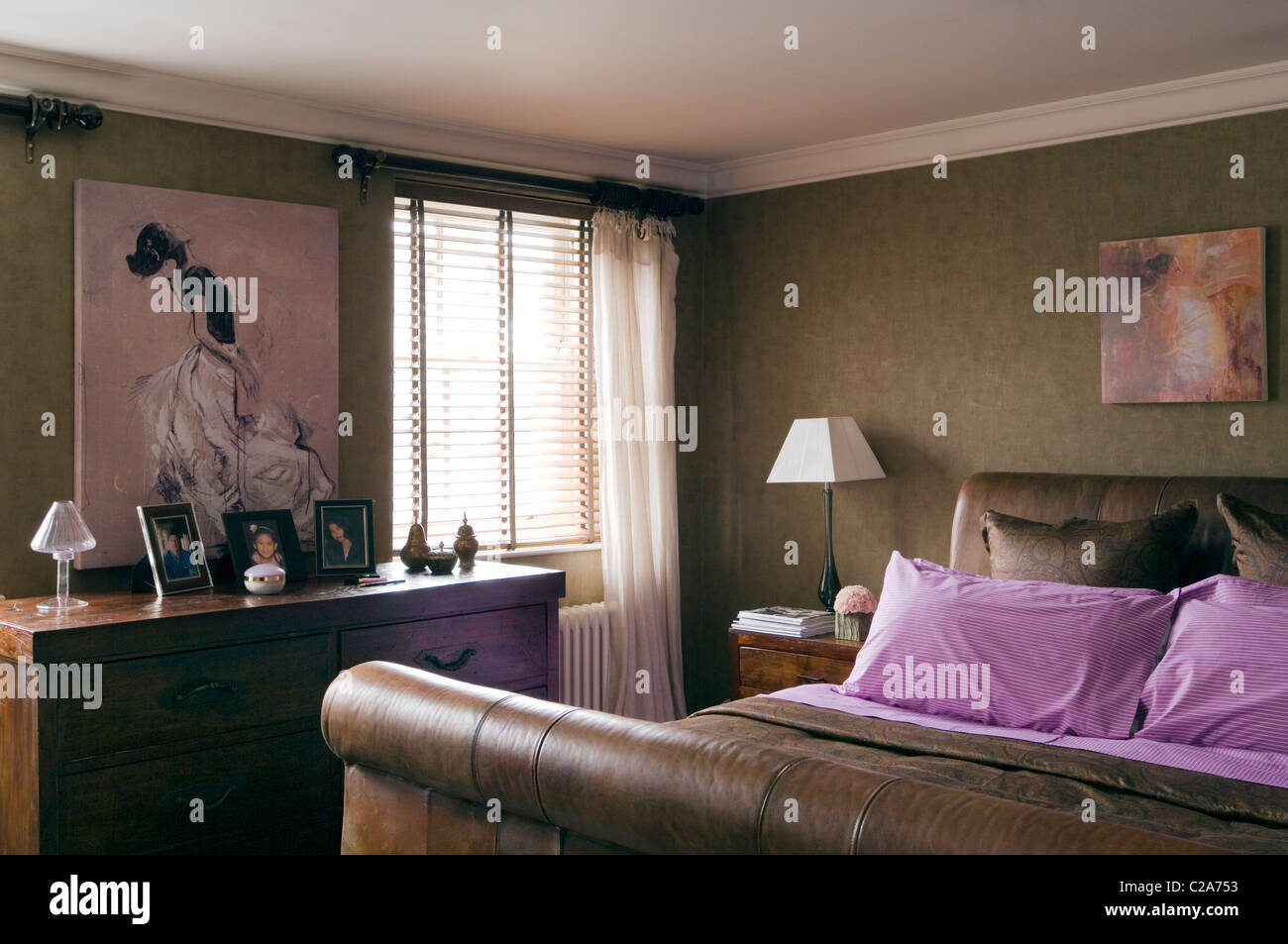 Central London apartment in pared down sleek decorated with touches of peacock Stock Photo