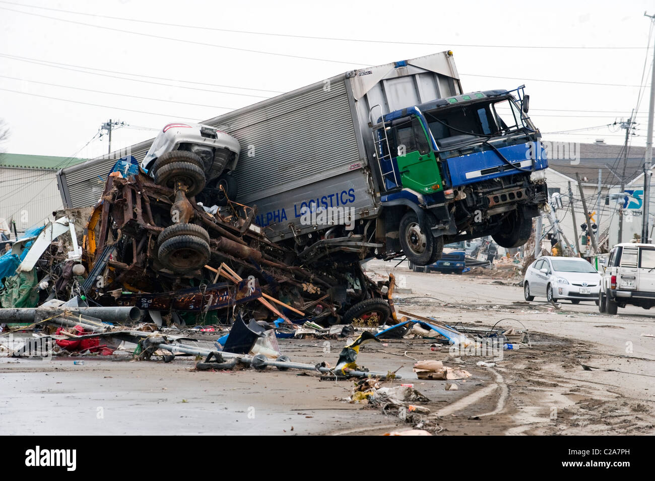 Thousands of cars and trucks were destroyed as were many victims after 9.0 Mw earthquake triggered a Tsunami Sendai 2011 Stock Photo