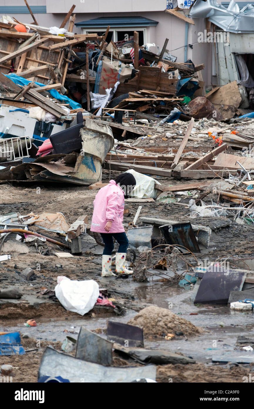 Fishing boats, cars and houses were completely destroyed after a 9.0 Mw earthquake triggered a Tsunami in the town of Yamada, Stock Photo