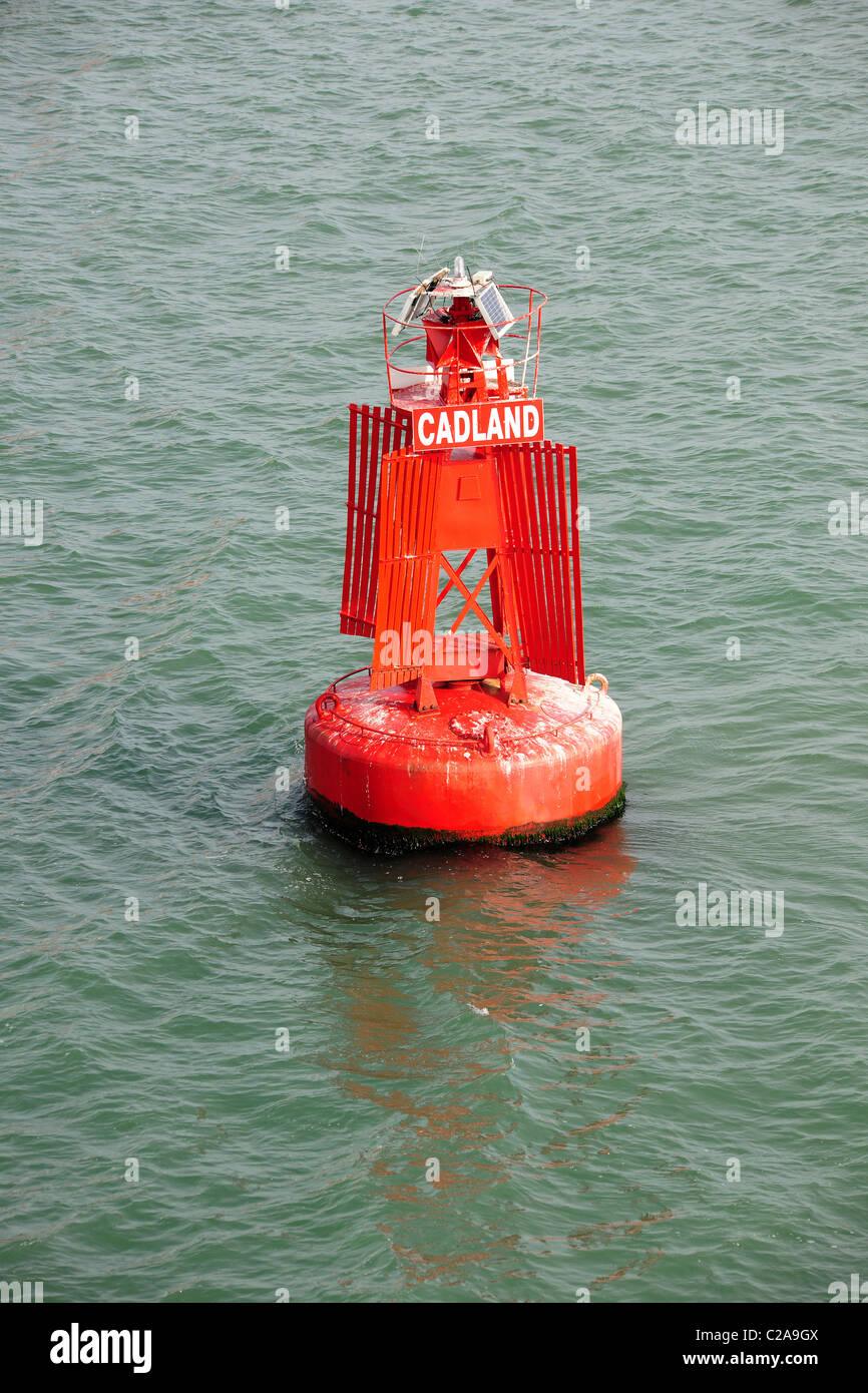 Port side red marker buoy. International shipping navigational aid. Stock Photo