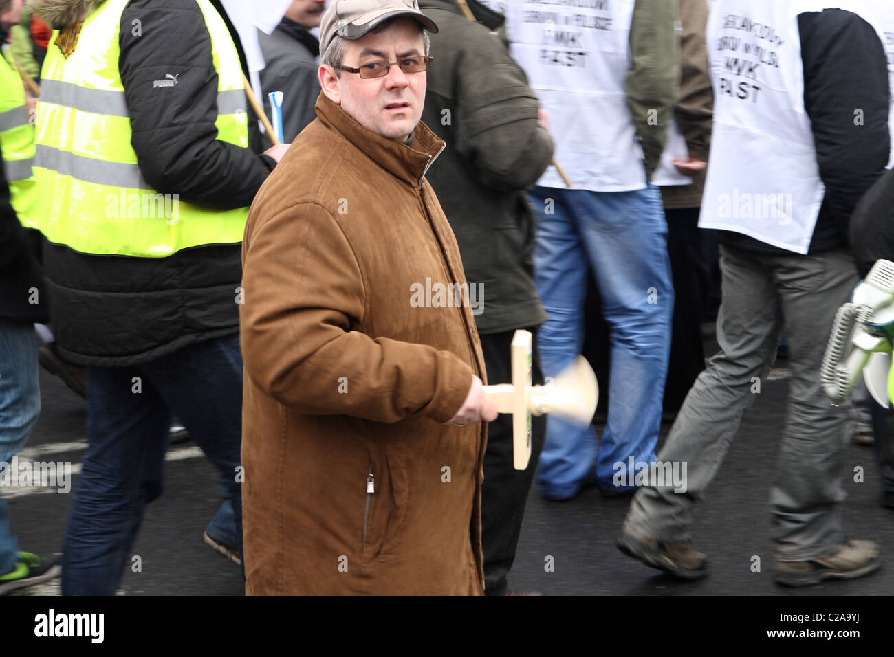 Man with clapper during coal miners protest against privatization in polish coal industry. Katowice, Poland. Stock Photo