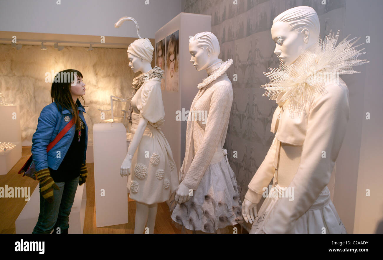 Teenage girl looking at design exhibit, Reykjavik Iceland Stock Photo