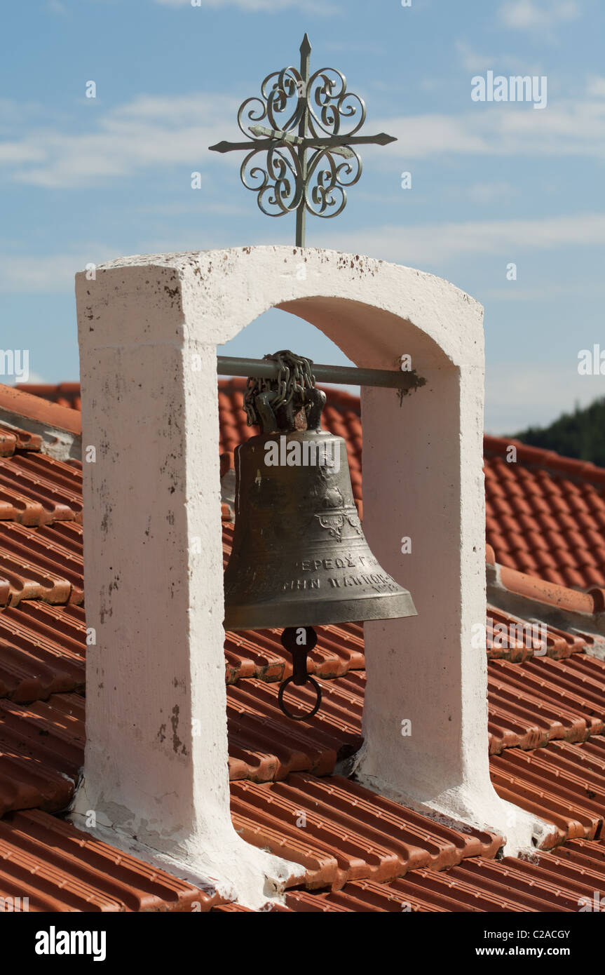 View of a rooftop bell in the village of Krokellio, Greece. Stock Photo