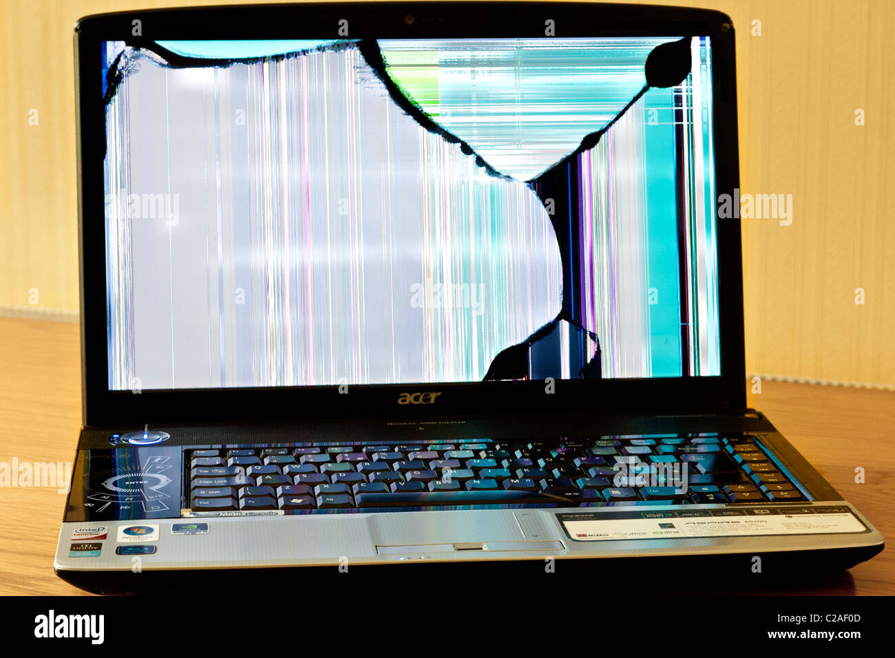 dropped laptop causing damage to casing and breaking lcd screen Stock Photo