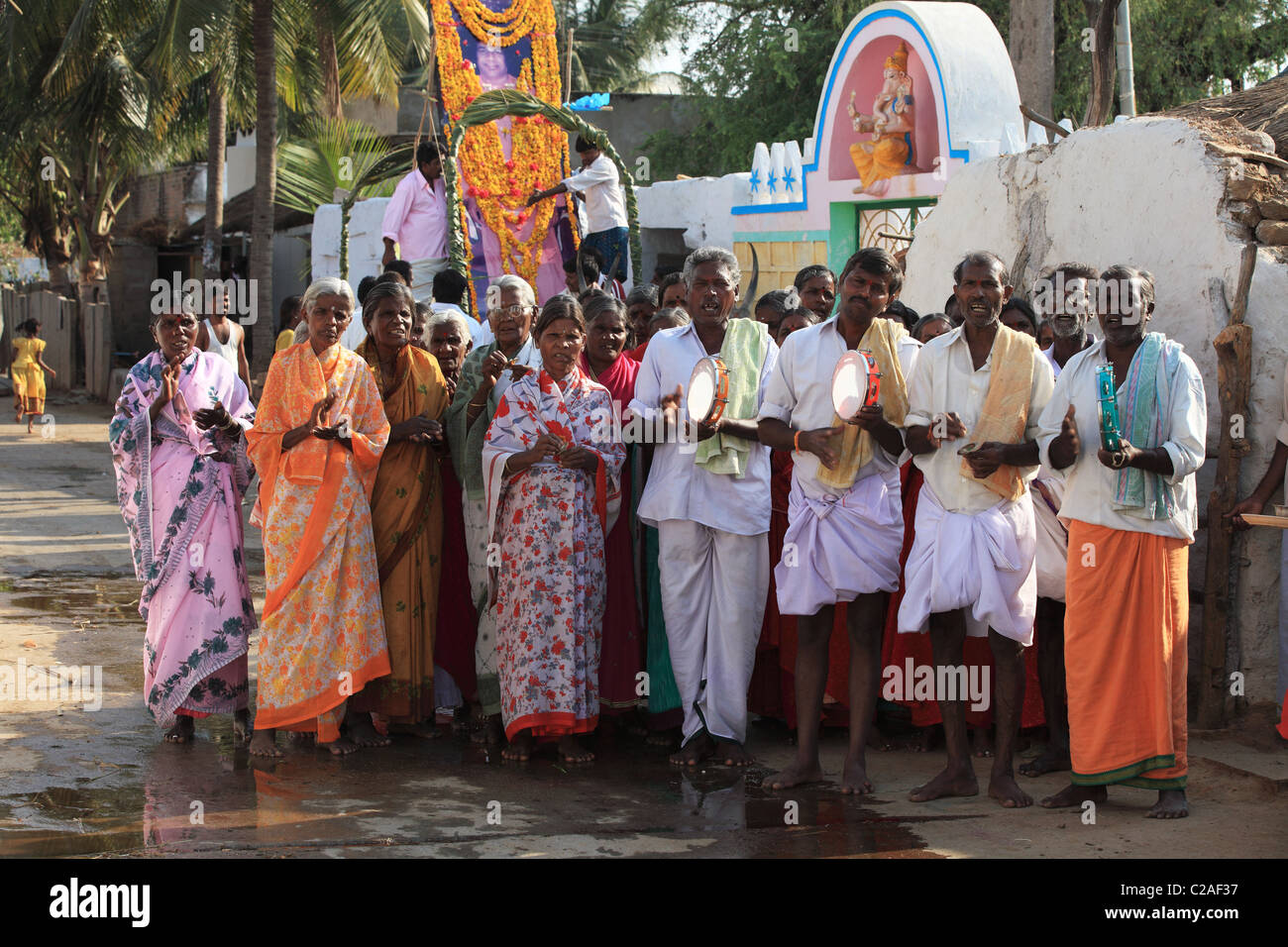 people singing bhajans for the good health of Bhagawan Sathya Sai Baba Andhra Pradesh South India Stock Photo