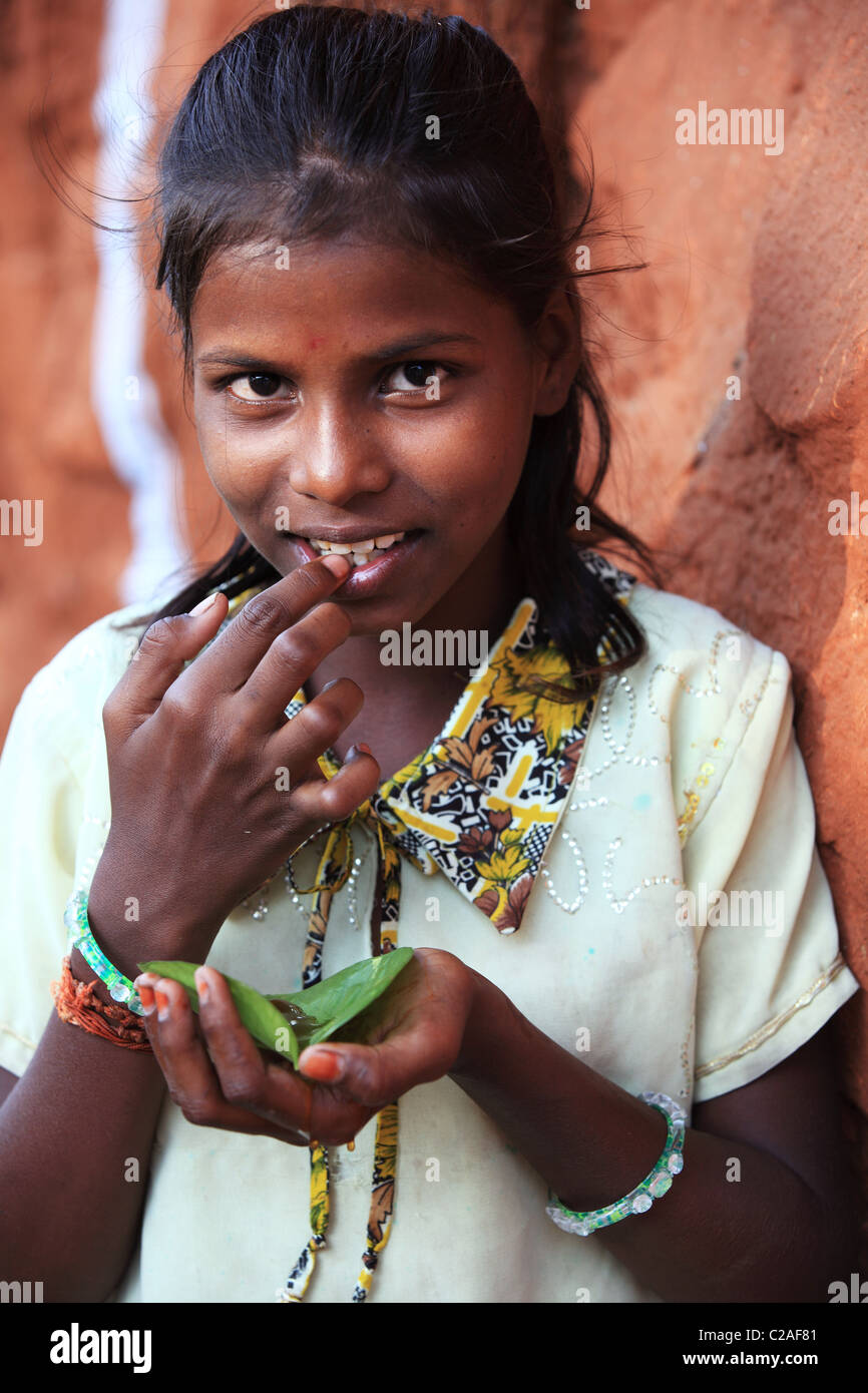 Indian girl eating honey Andhra Pradesh South India Stock Photo - Alamy