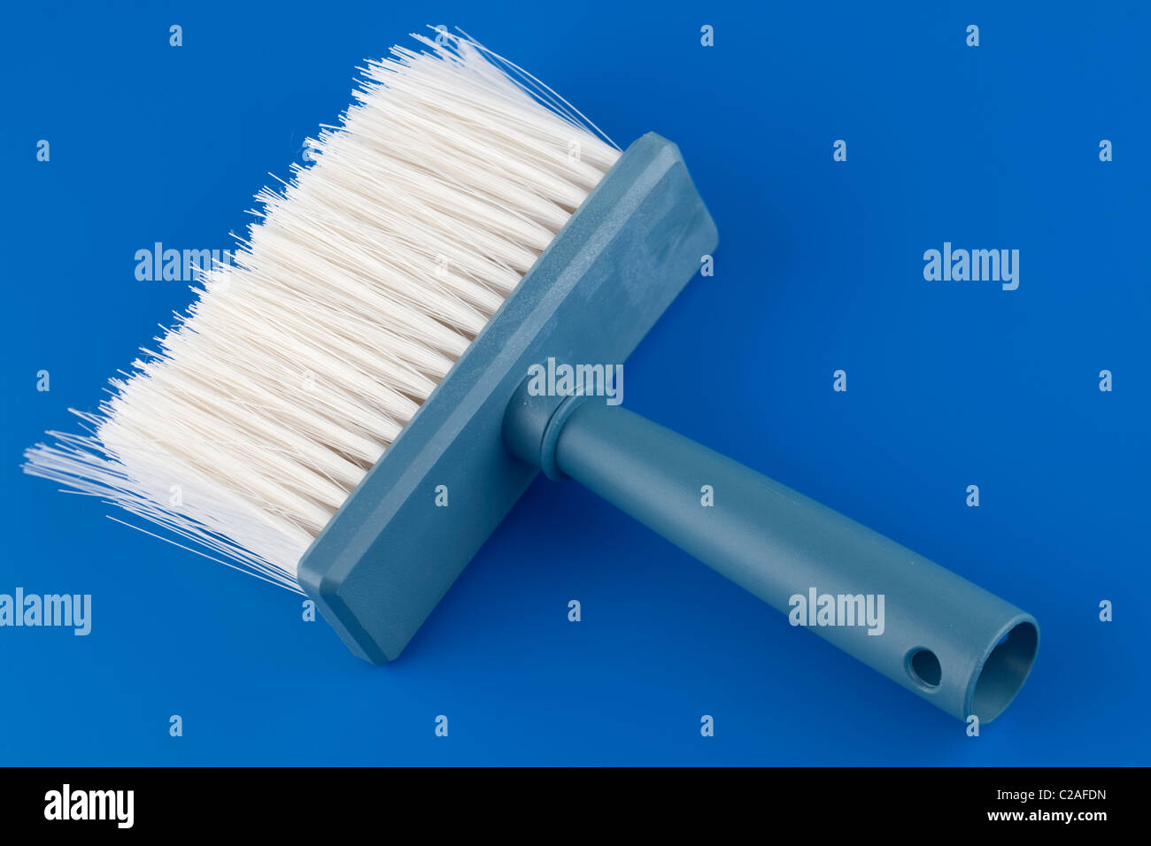 Nylon blue handled wallpaper paste brush Stock Photo Alamy
