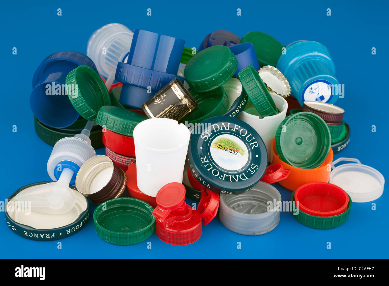 Pile of mixed product bottle and jar tops Stock Photo Alamy