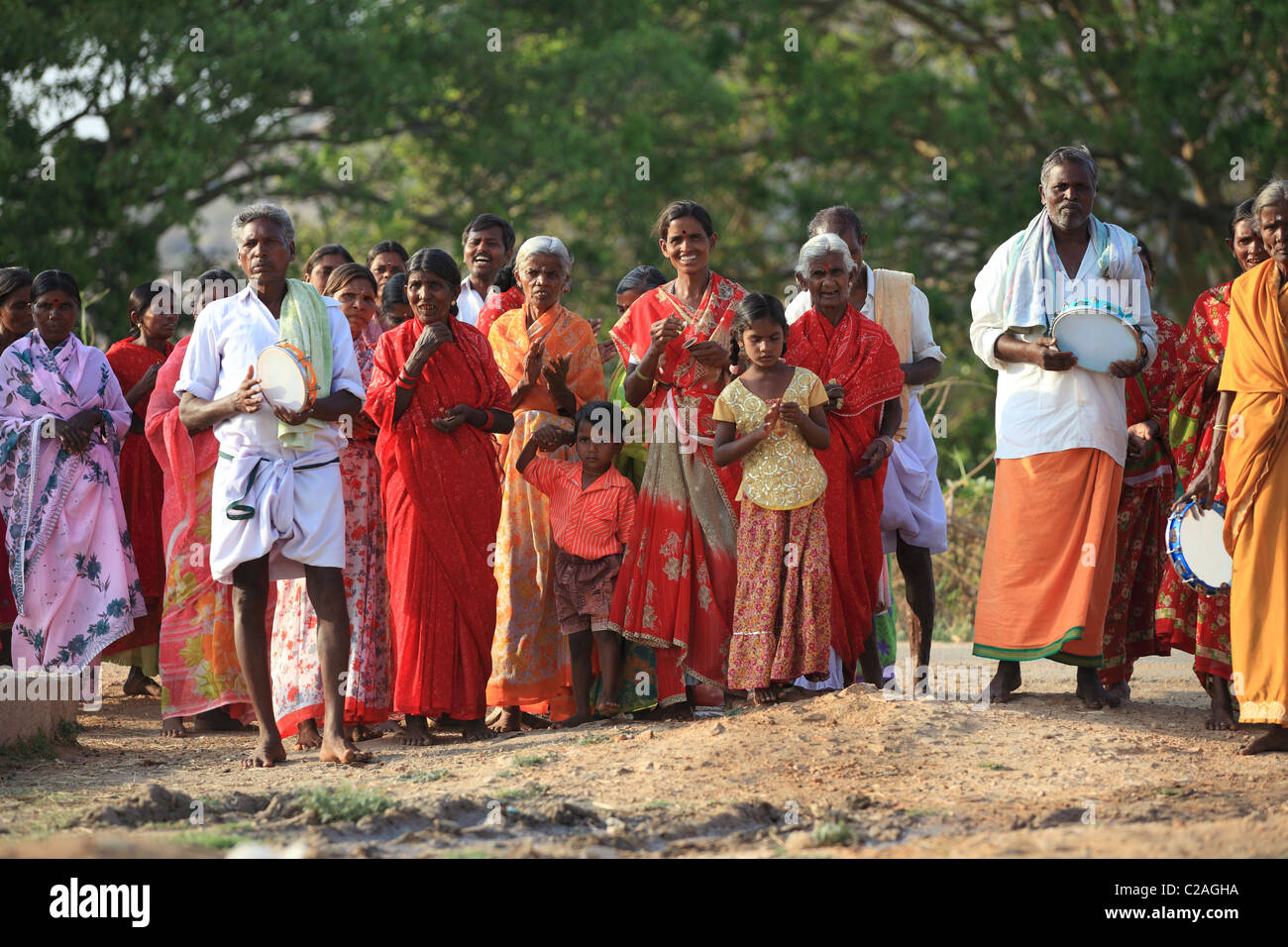 people singing bhajans for the good health of Bhagawan Sathya Sai Baba Andhra Pradesh South India Stock Photo