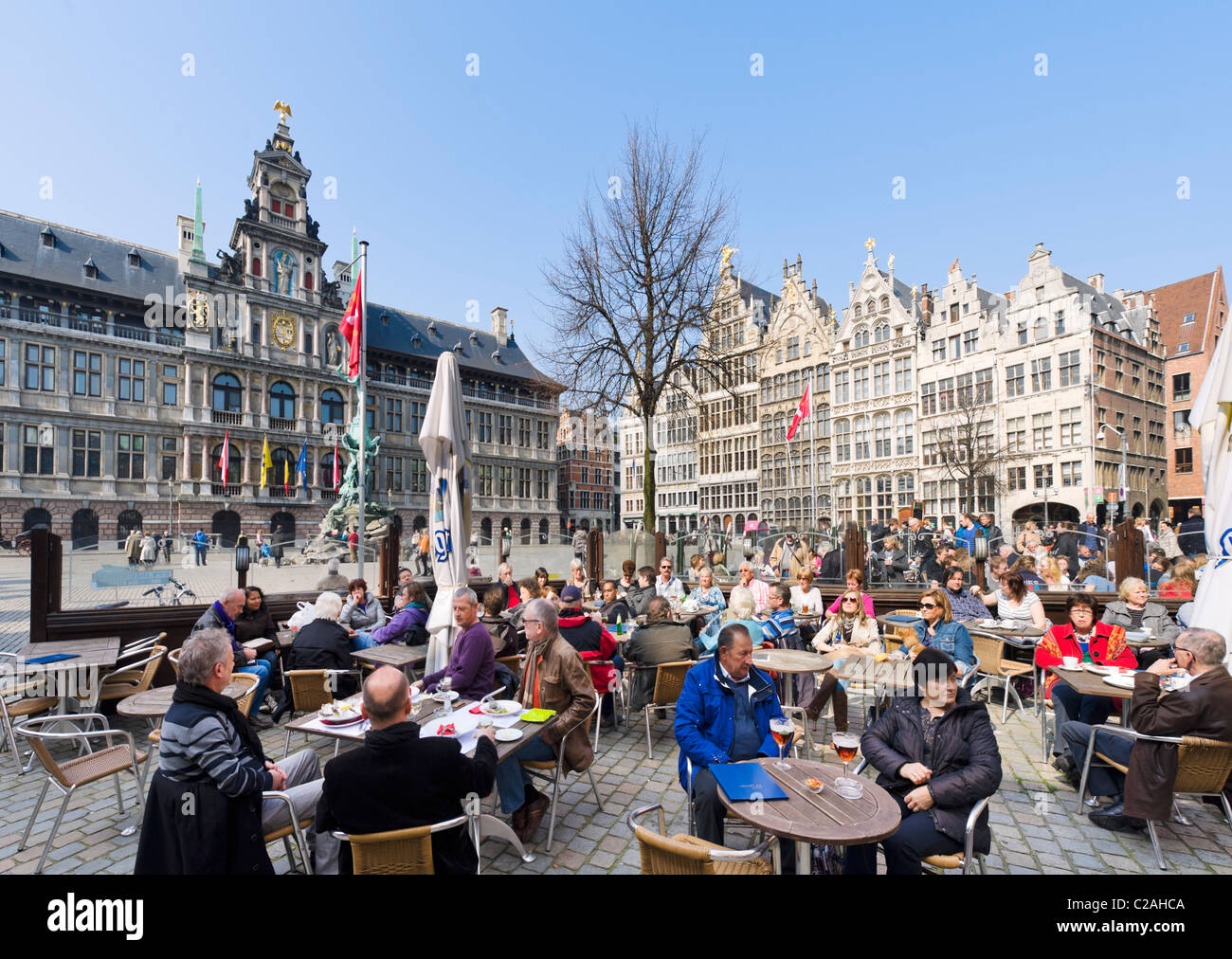 Sidewalk cafe in the Grote Mark (Main Square) with the Stadhuis (Town Hall) to the left, Antwerp, Belgium Stock Photo