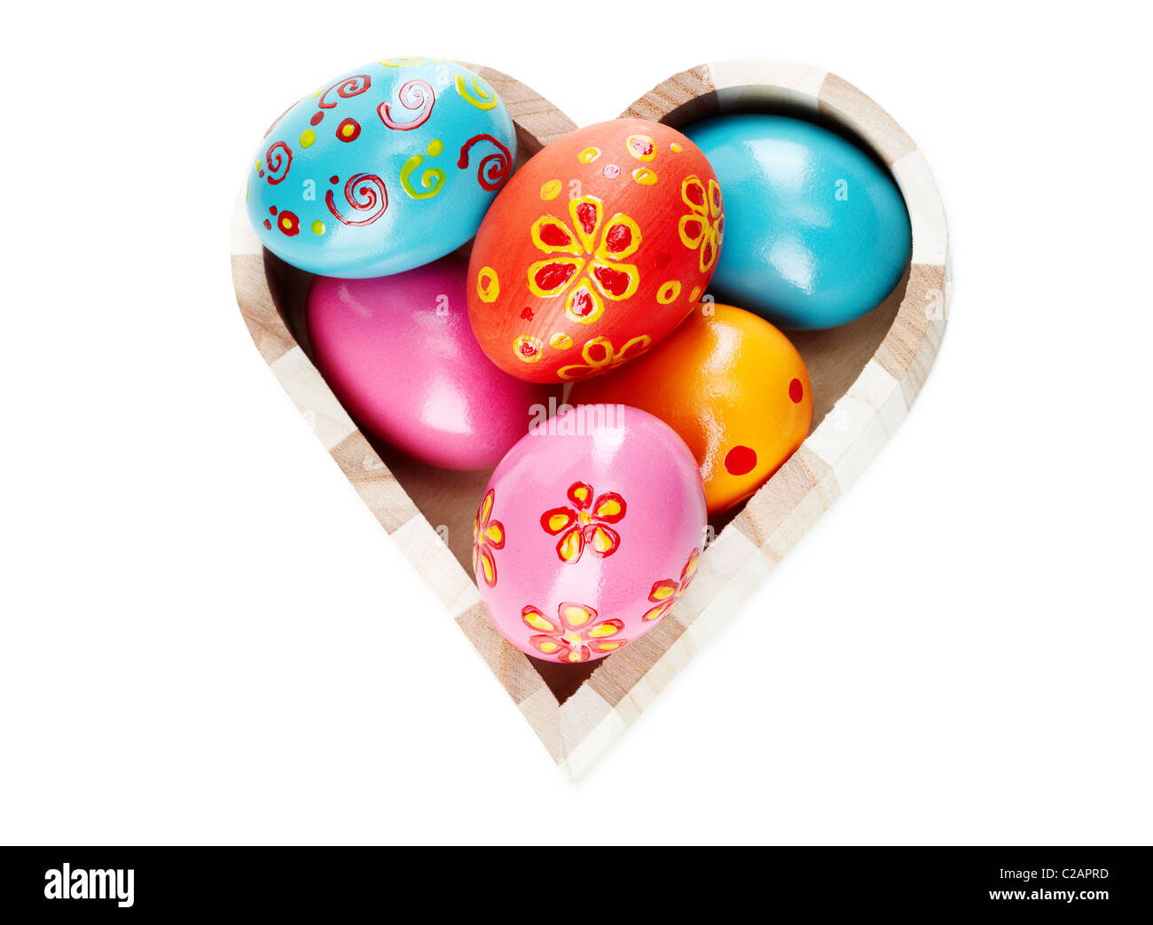 Heart shaped box full of colorful Easter eggs Stock Photo