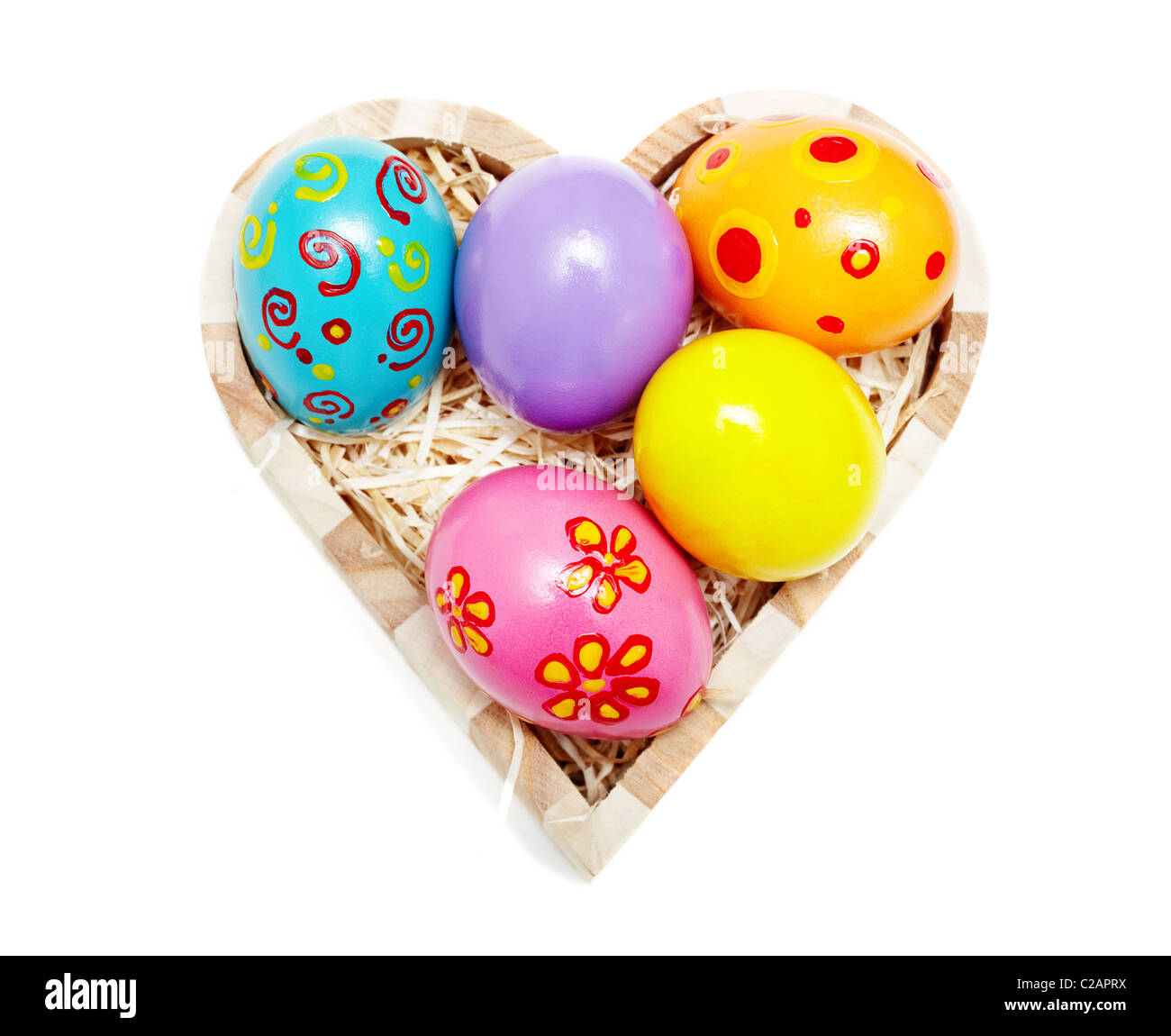 Heart shaped box full of colorful Easter eggs Stock Photo