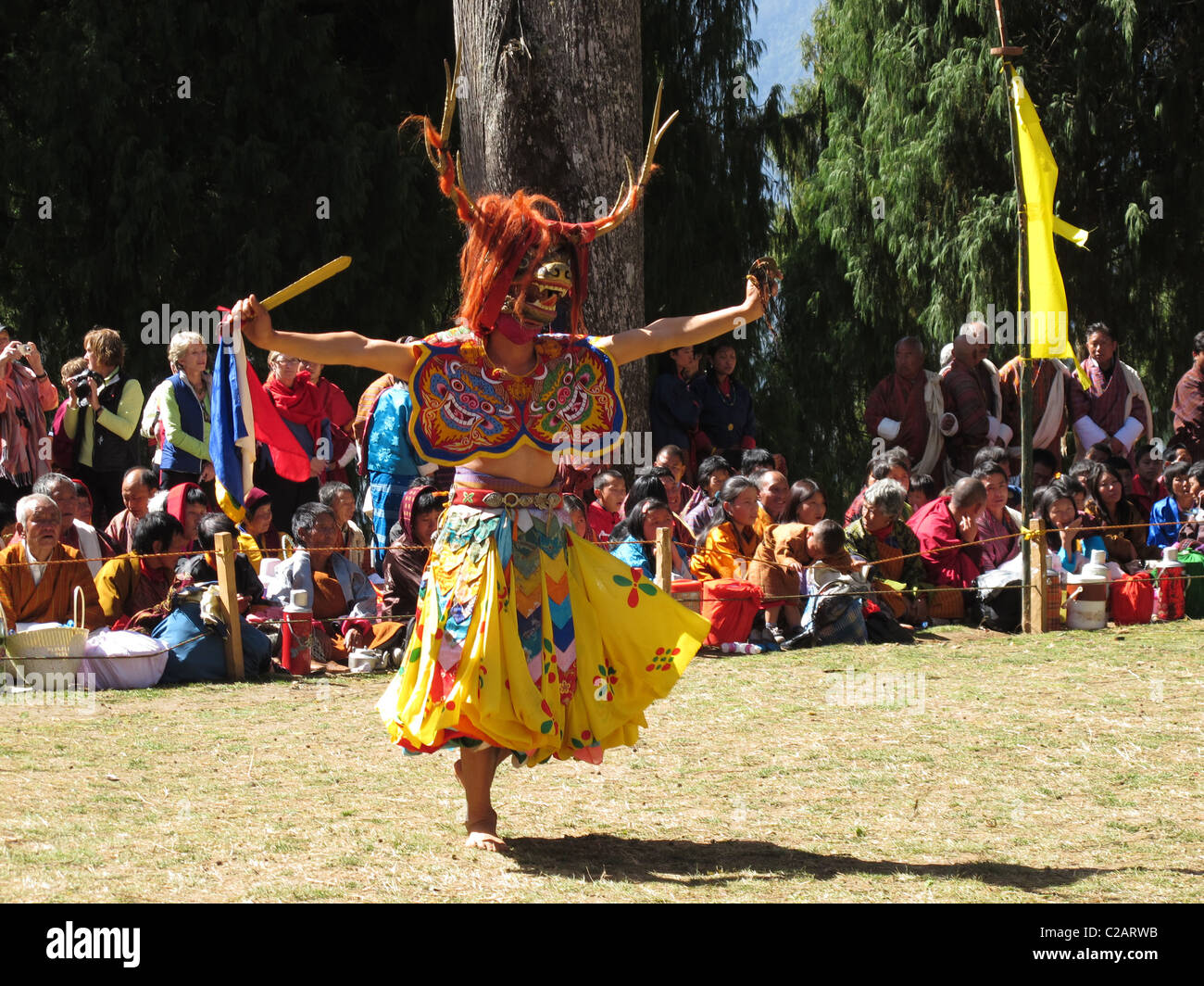 Dancer and audience, Talo festival, Bhutan Stock Photo