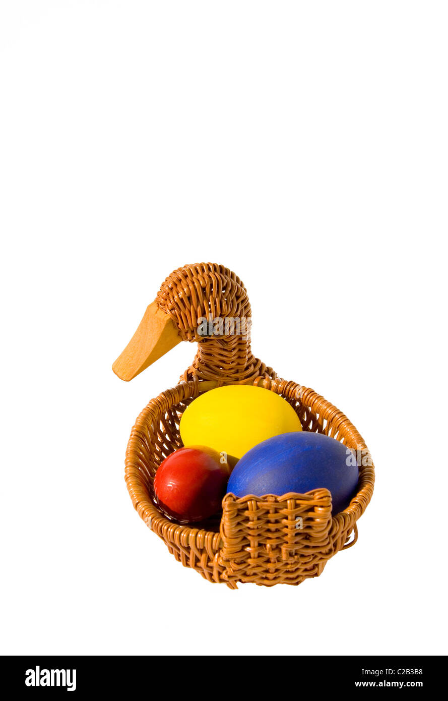 isolated color Easter eggs in basket on white background Stock Photo ...