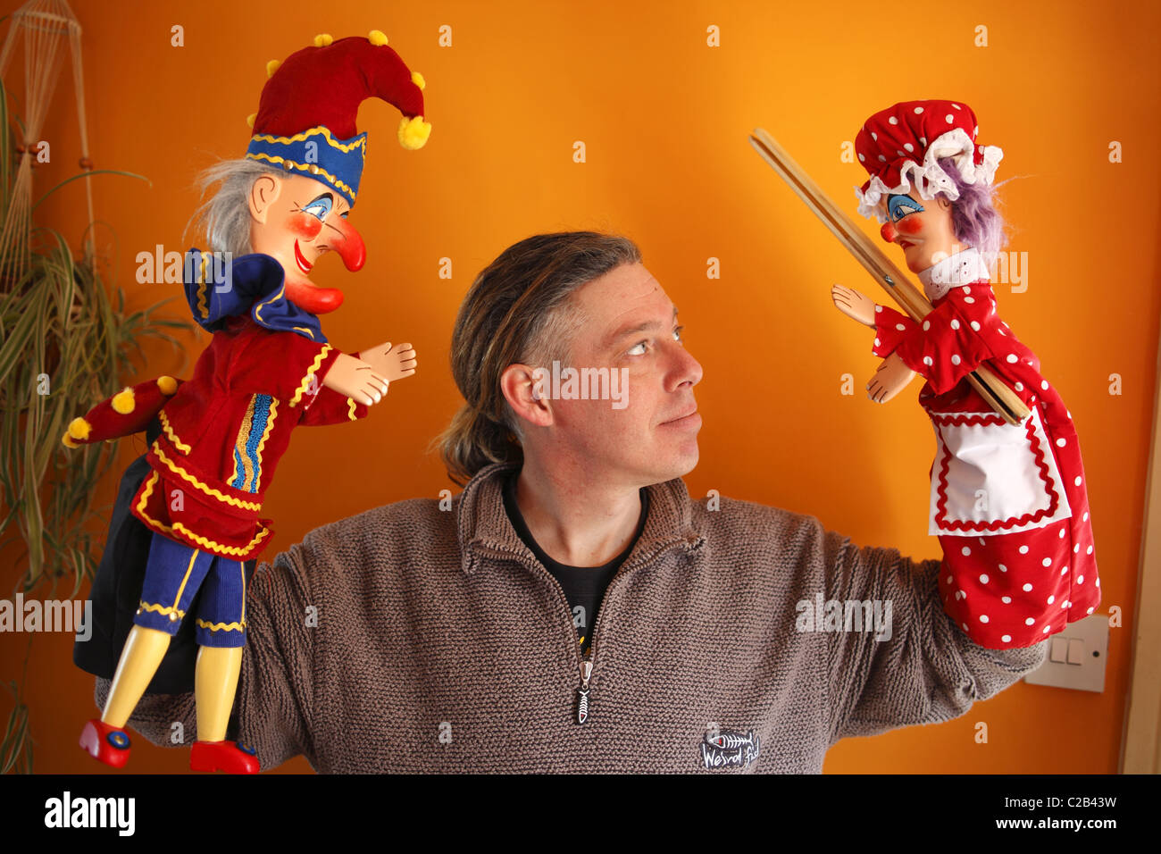 Professor Mark Poulton with his Punch and Judy puppets. Stock Photo