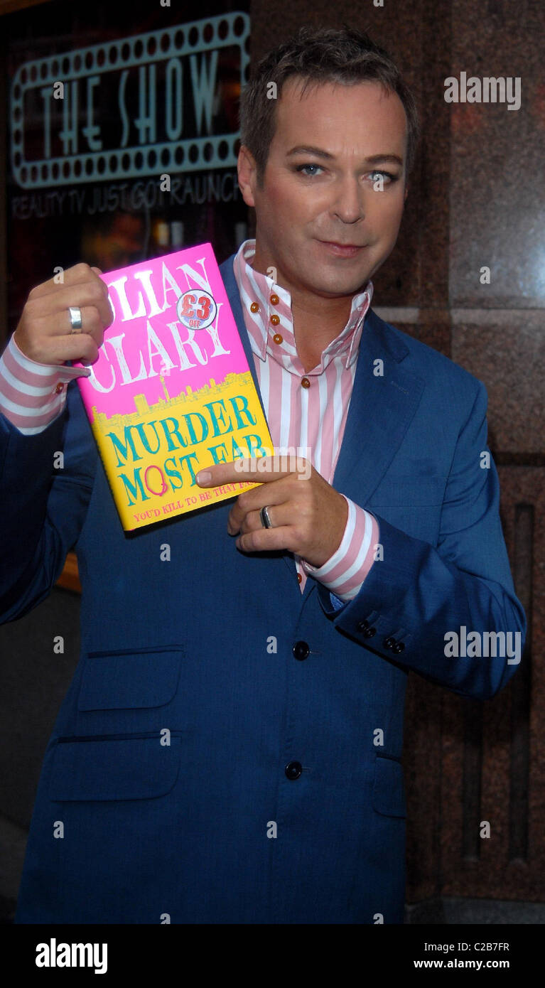 Comedian Julian Clary signs his debut novel 'Murder Most Fab' at