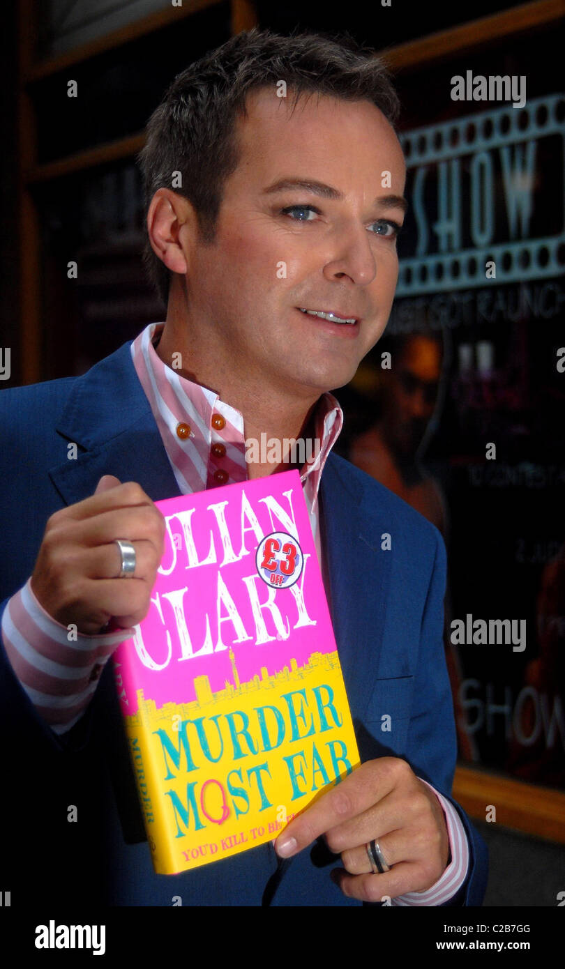 Comedian Julian Clary signs his debut novel 'Murder Most Fab' at