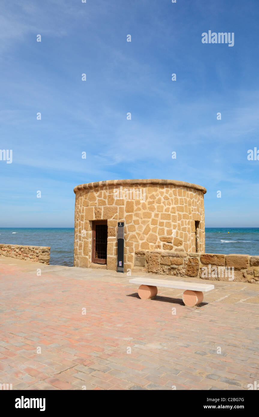 Torre De La Mata watchtower at Plaza Del Embarcadero in Torrevieja, Alicante, Spain. Stock Photo