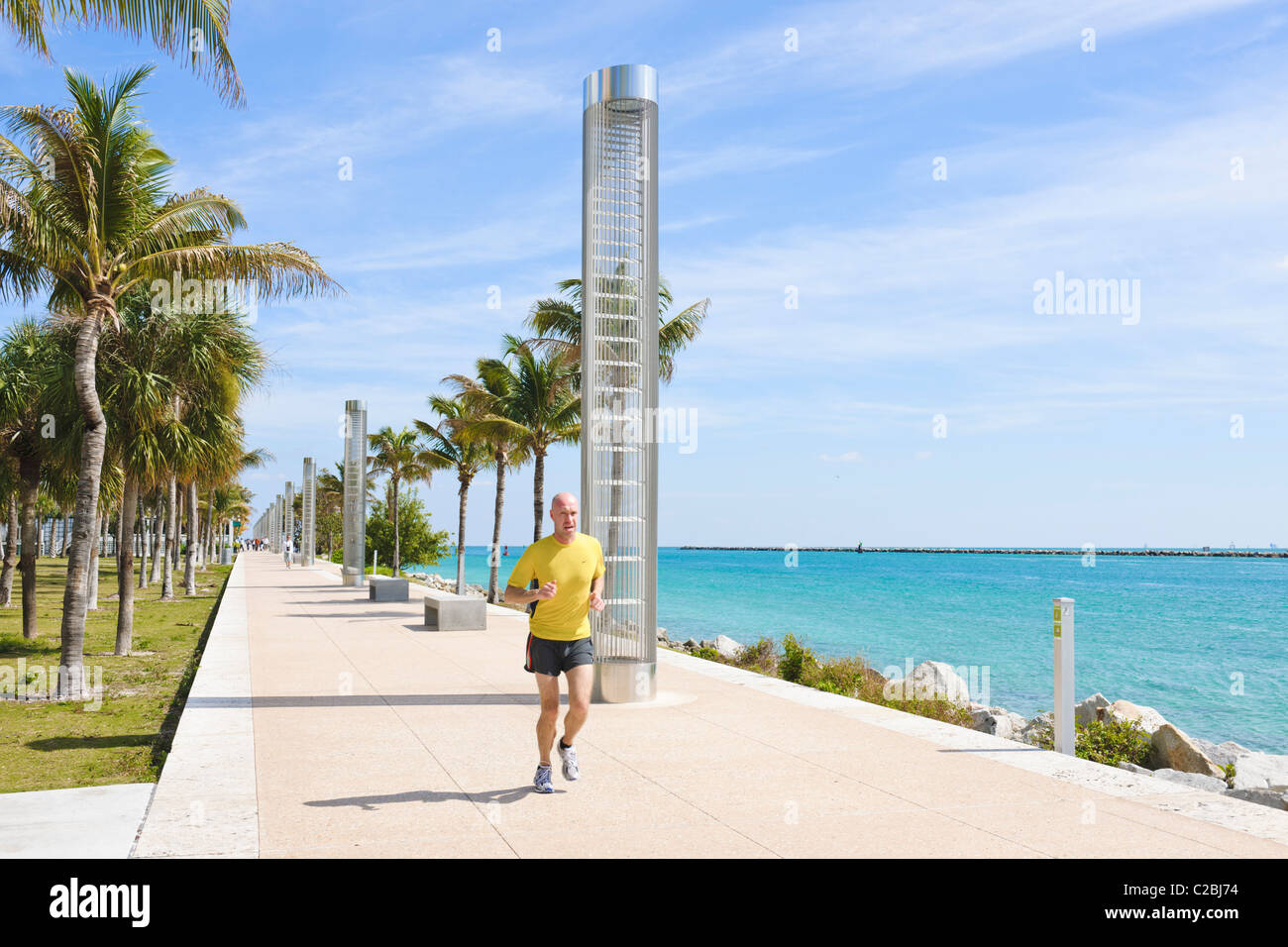Man jogging, south pointe park, Miami Stock Photo