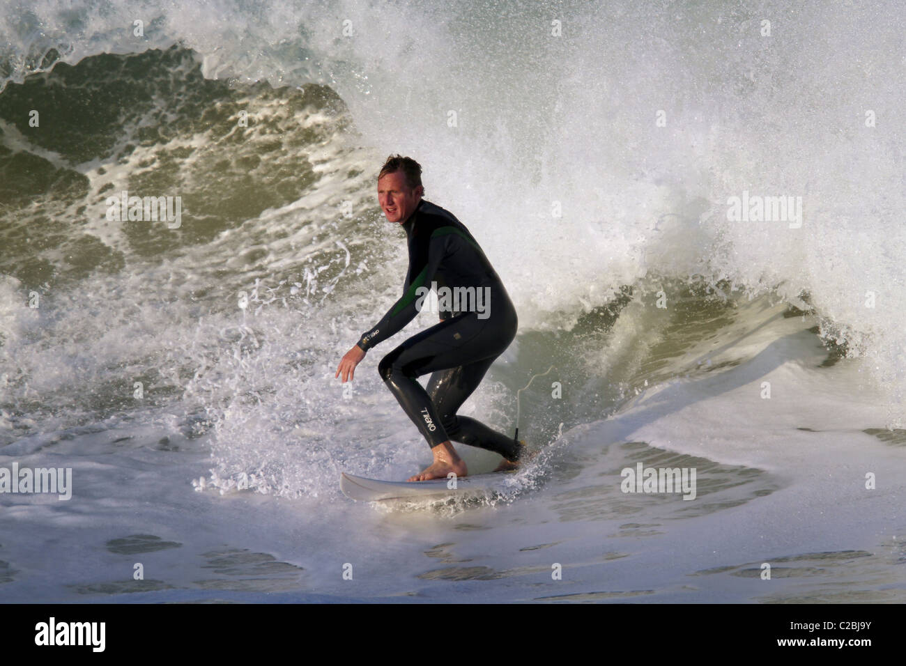 LOCAL SURFER JEFFREYS BAY SURFER JEFFREYS BAY SURFER JEFFREYS BAY SOUTH AFRICA 22 June 2010 Stock Photo
