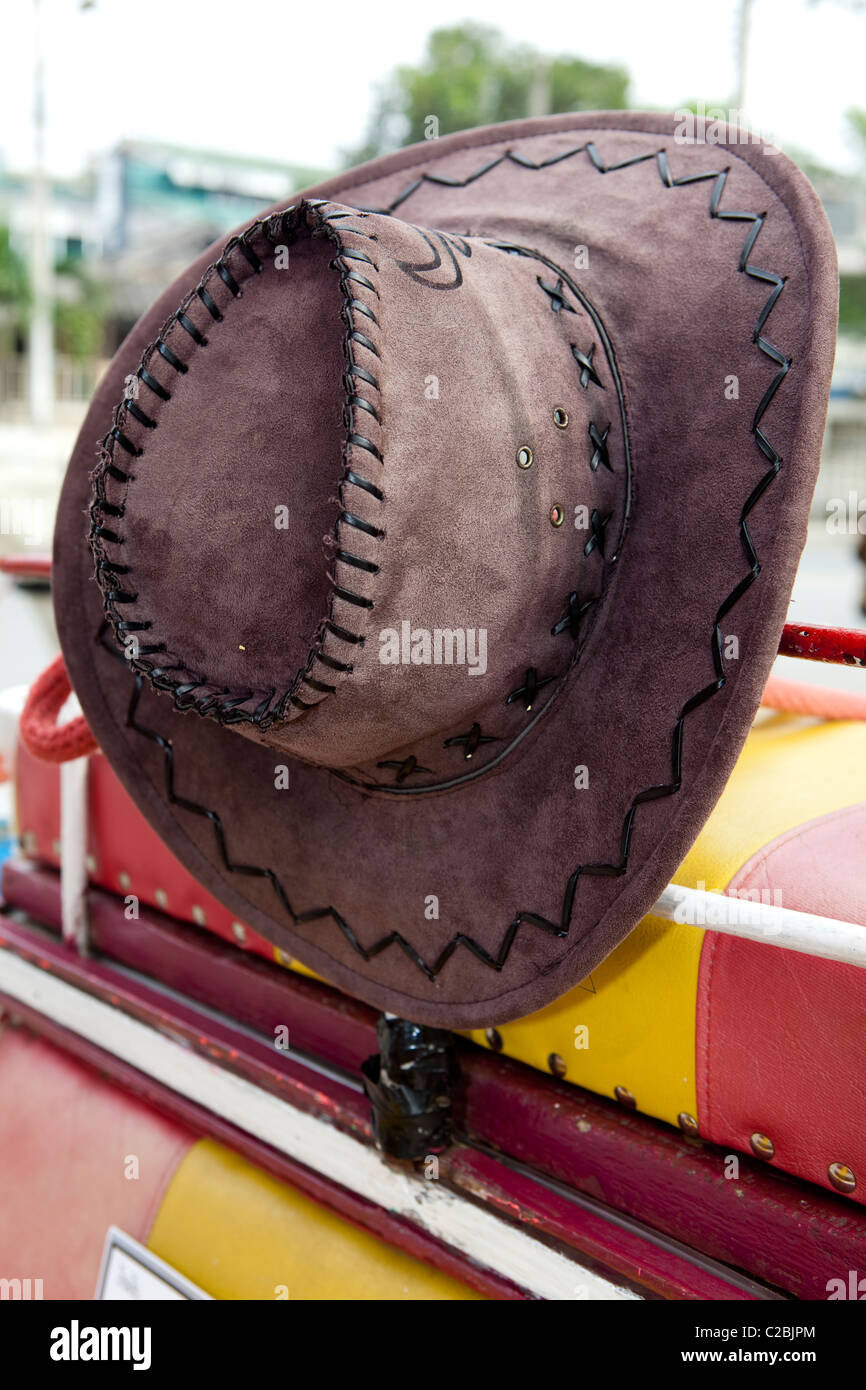 Cowboy hat in horse carriage in Lampang, Thailand Stock Photo