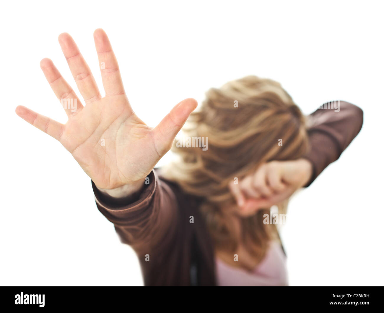 woman protect herself from violence isolated on white Stock Photo
