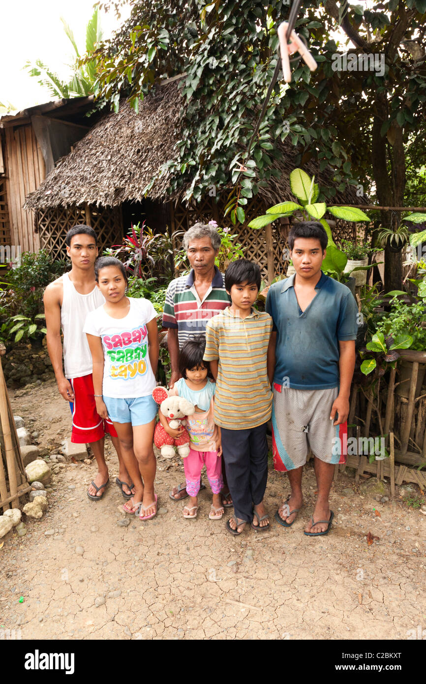 Portrait of a Filipino family outside their house. Iloilo the Philippines Stock Photo