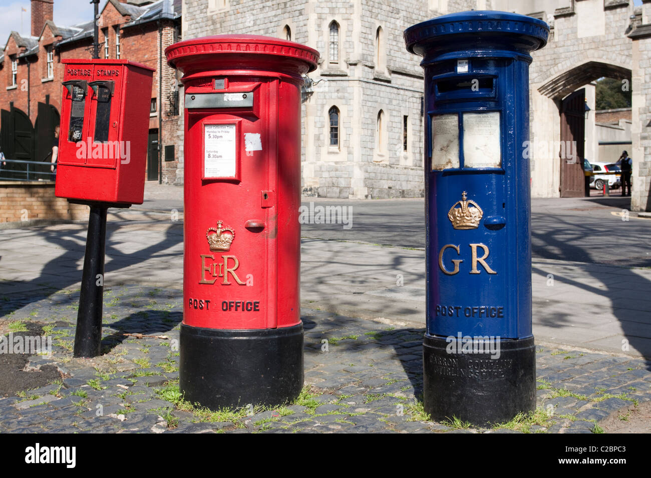Red and blue pillar/post boxes in Windsor, Berkshire, England, UK Stock  Photo - Alamy