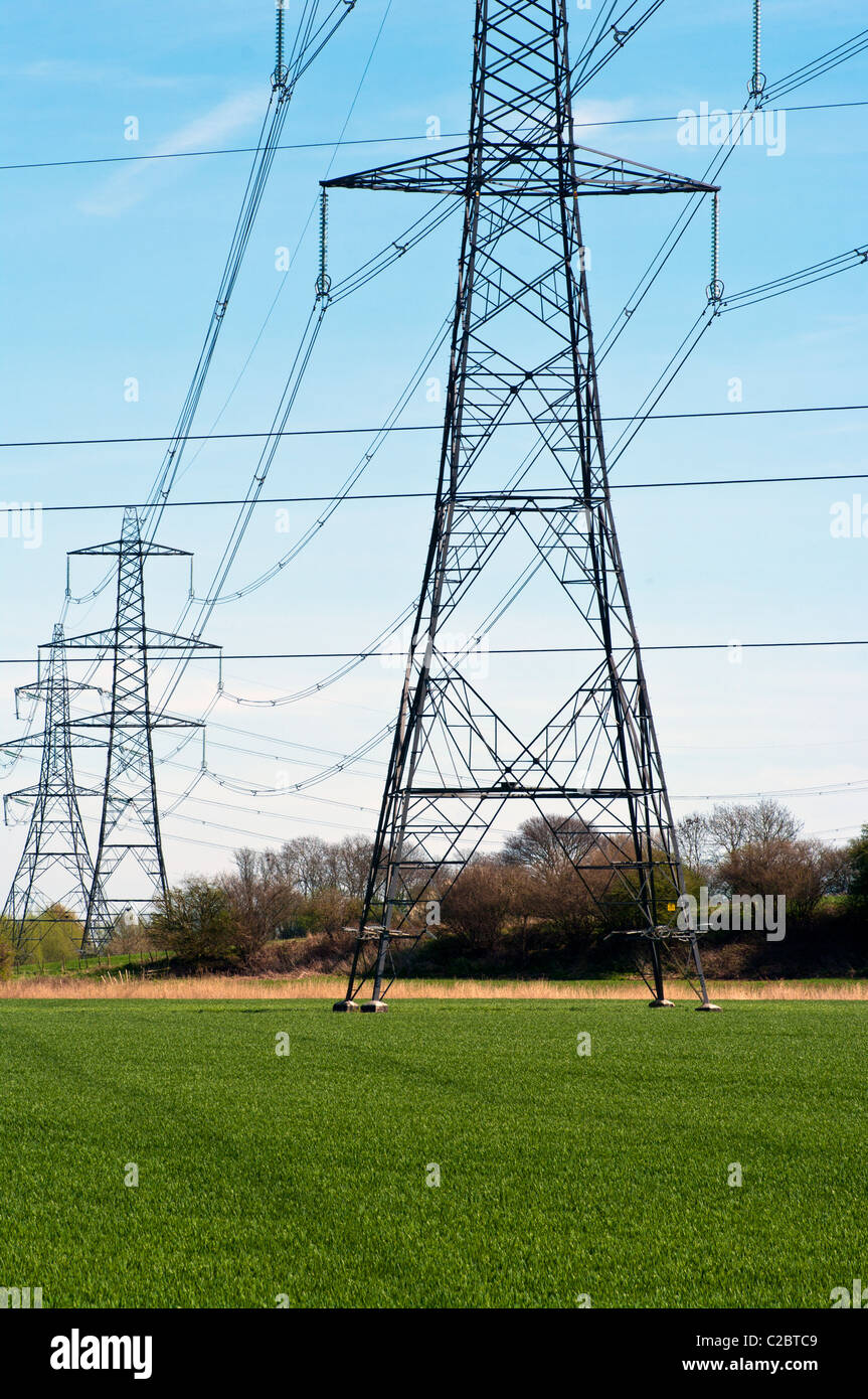Electricity Pylons Across The Countryside Stock Photo - Alamy