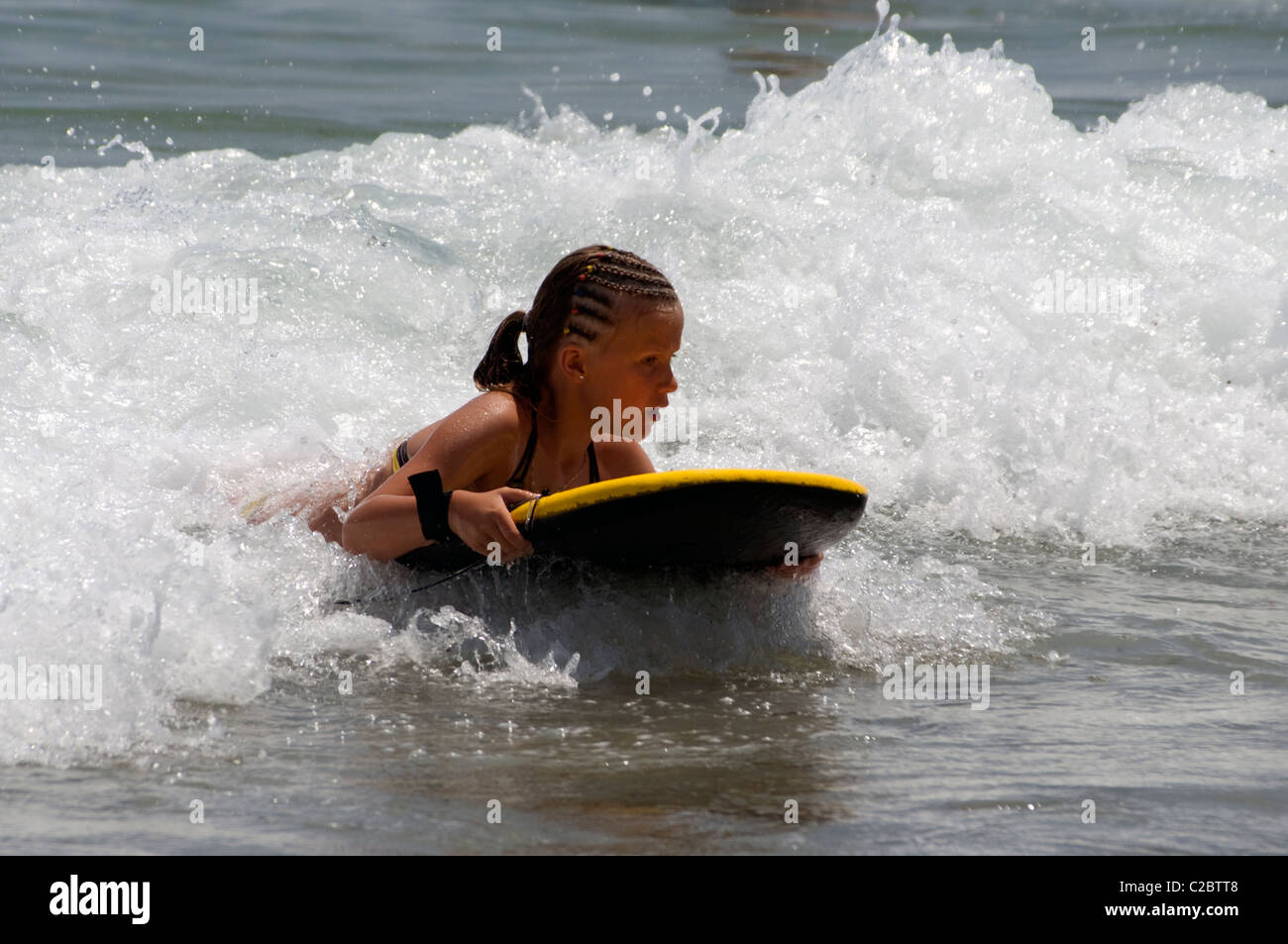 Young girl with bodyboard hires stock photography and images Alamy