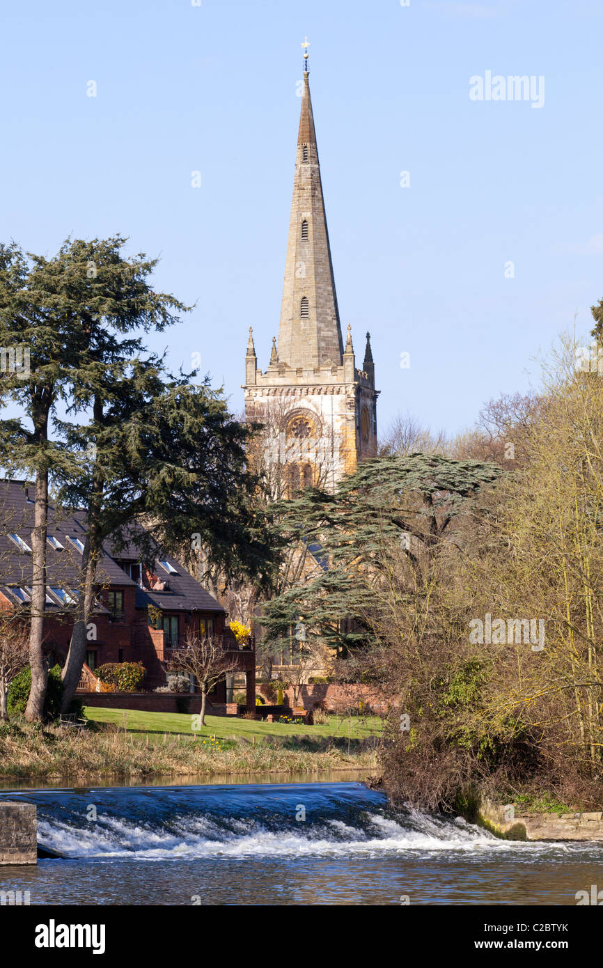 Springtime at Holy Trinity church, beside a weir on the River Avon, Stratford upon Avon, Warwickshire, England, UK Stock Photo